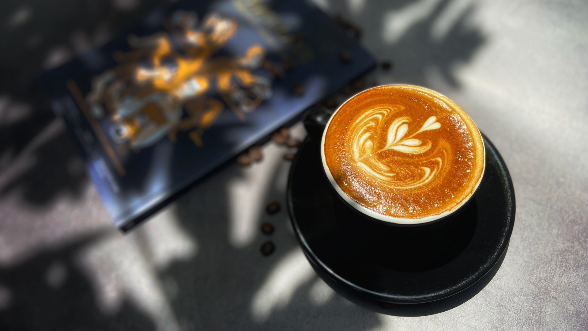 Coffee latte art with magazine